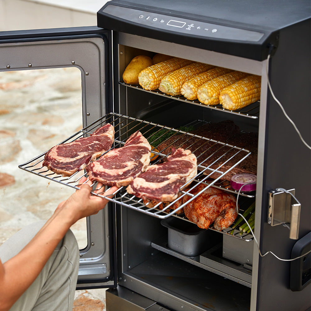 East Oak 30-inch electric smoker in the backyard, an excellent choice for electric smoking grill recipes, from smoked brisket to burnt ends. The best barbecue smoker for home use.